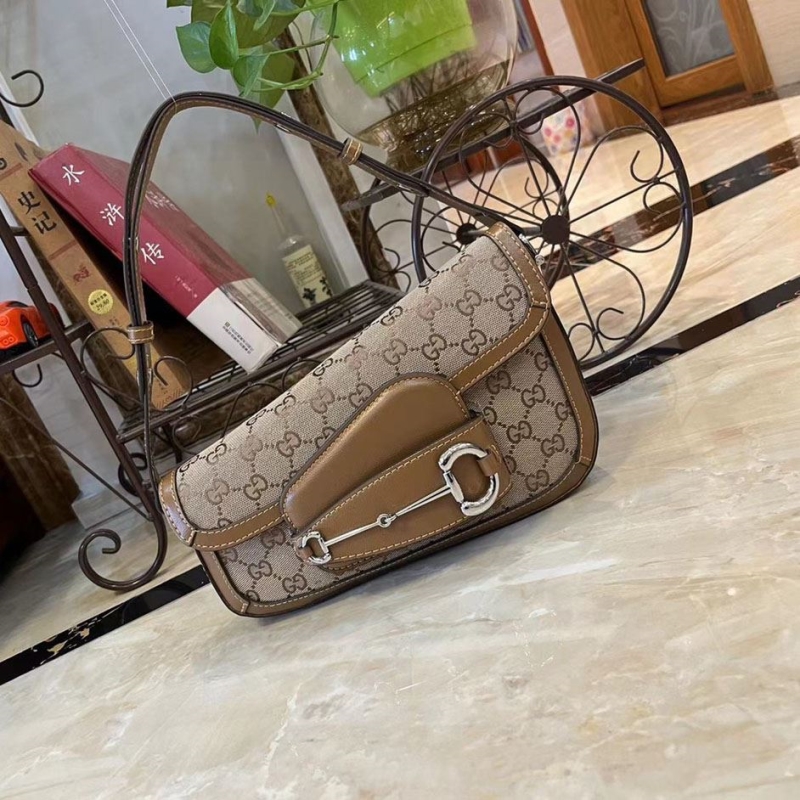 G*u*i top handle bags